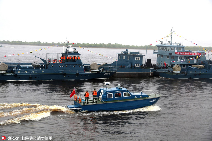 Hundreds of patrol boats set sail in China-Russia border river
