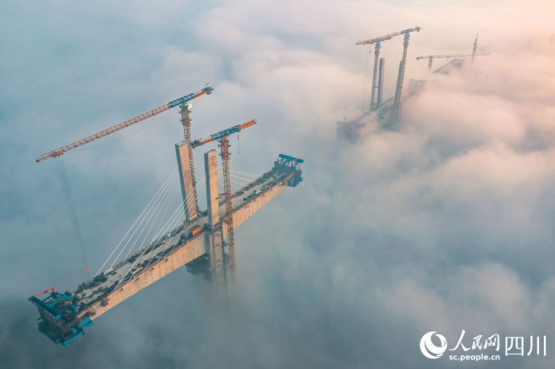 A glimpse into construction of super bridge in the clouds in SW China