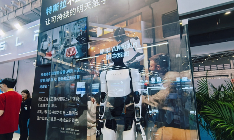 Tesla's humanoid robot is on display at the 2025 China International Consumer Products Expo in Haikou, Hainan Provine on April 13, 2025. Photo: Zhang Yiyi/GT