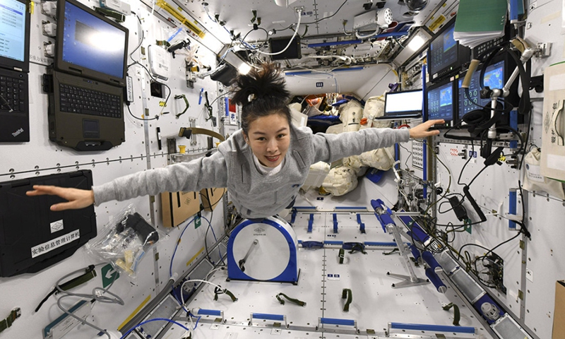 Photo provided by the Astronaut Center of China shows Chinese female taikonaut Wang Yaping in the space station core module Tianhe.(Photo; Xinhua)