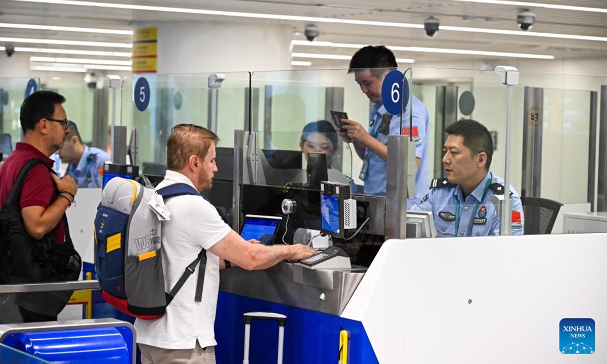 Inbound passengers go through border inspection procedures at Haikou Meilan International Airport in Haikou, south China's Hainan Province, Oct. 15, 2025. Hainan has handled 2 million inbound and outbound trips crossing the border this year as of Oct. 15, with foreign travelers accounting for 53 percent of the total, according to the Haikou General Station of Immigration Inspection. Hainan has long enjoyed favorable visa-free entry policies in China. The majority of foreigners who enter Hainan do so under the visa-free entry policy. (Xinhua/Yang Guanyu)